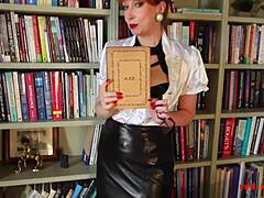 Mature beauty indulges in self-pleasure in her personal library